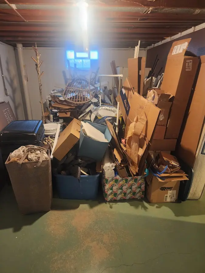 Roll-off dumpster container at job site for 15 Yard Dumpster Rental in Tuscumbia